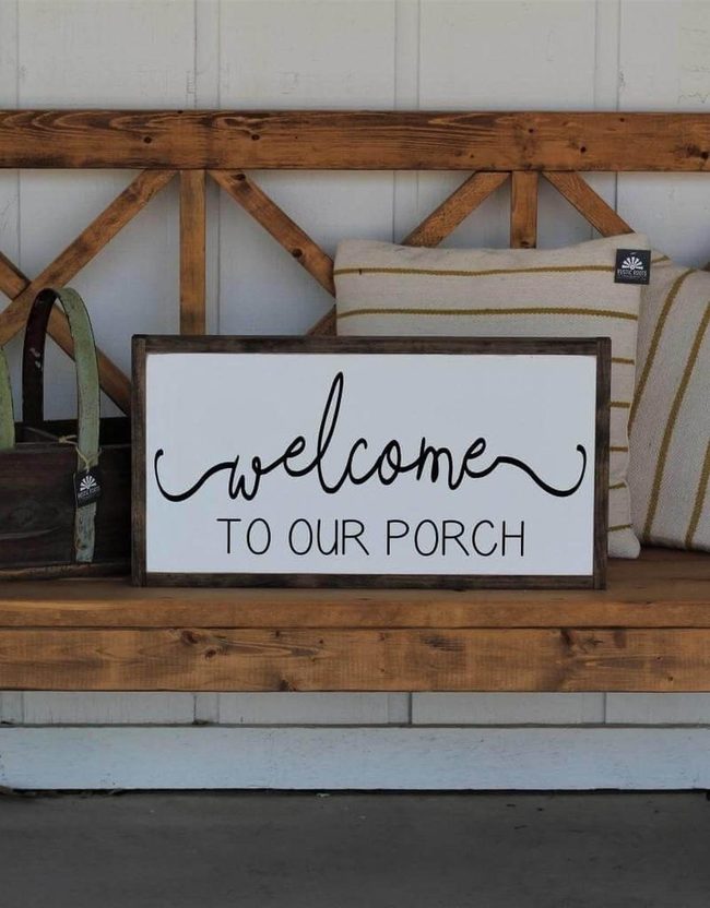 Black Welcome On Natural Wood