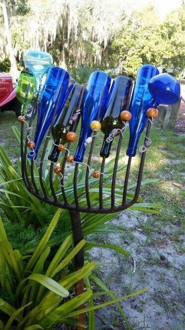 Blue Glass Bottles Dancing Garden Forks