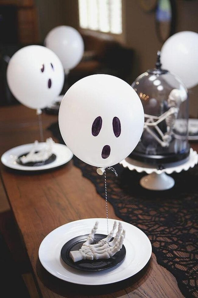 White Balloon Ghosts Over Skeleton Feast