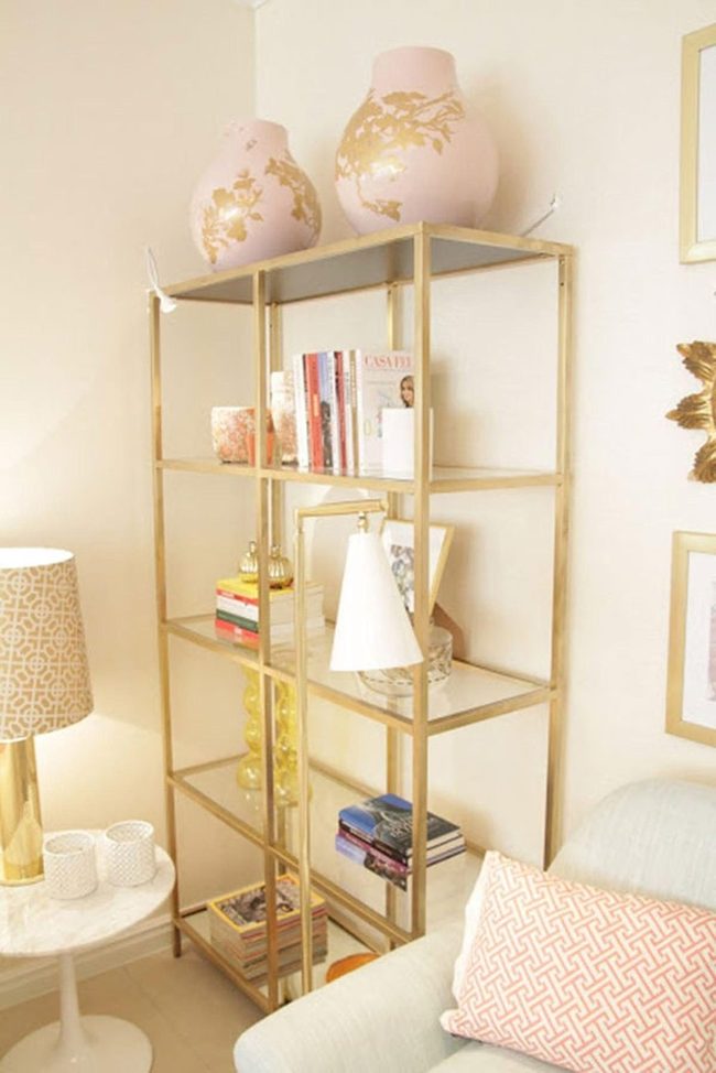 Gold-Framed Books And Glass Bottles