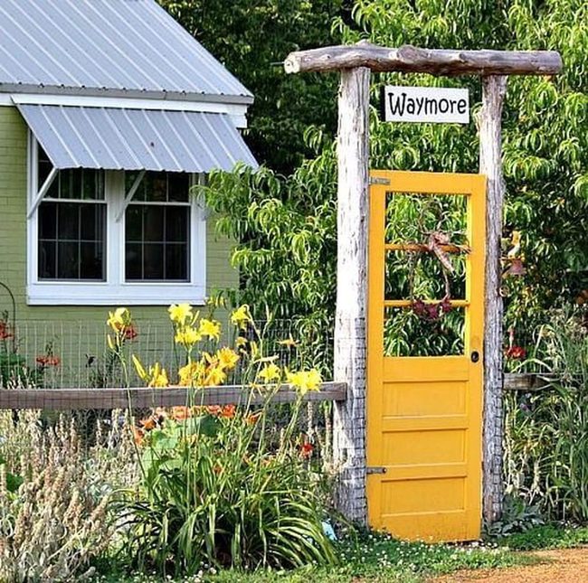 Bright Yellow Door Garden Entry