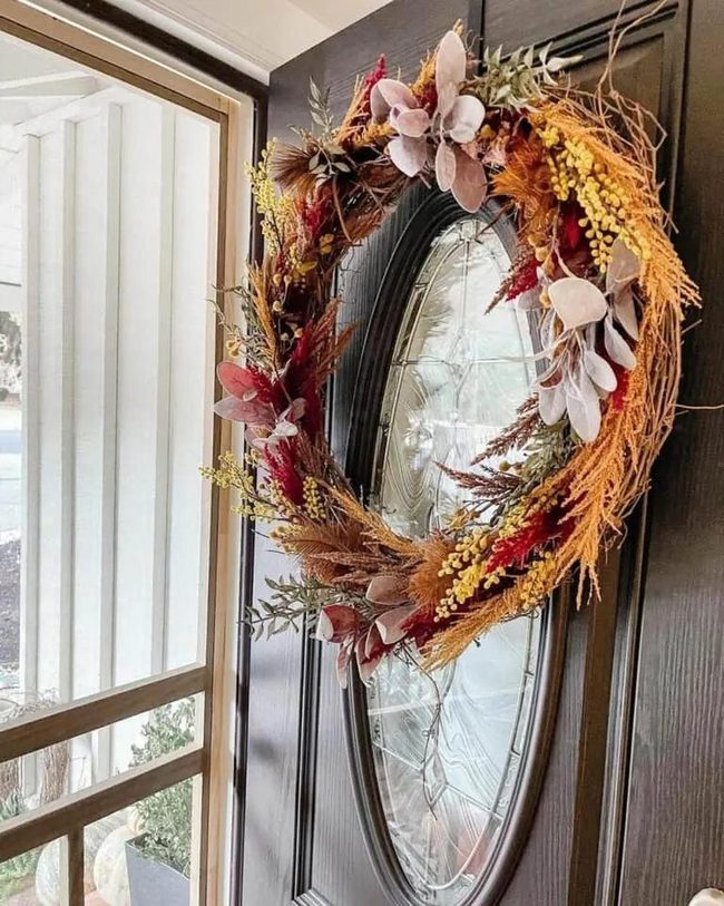 Autumn Wreaths Against Dark Doors