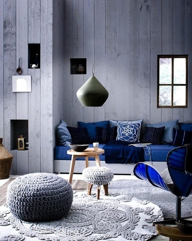 Green Pendant Blue Sofa Gray Walls