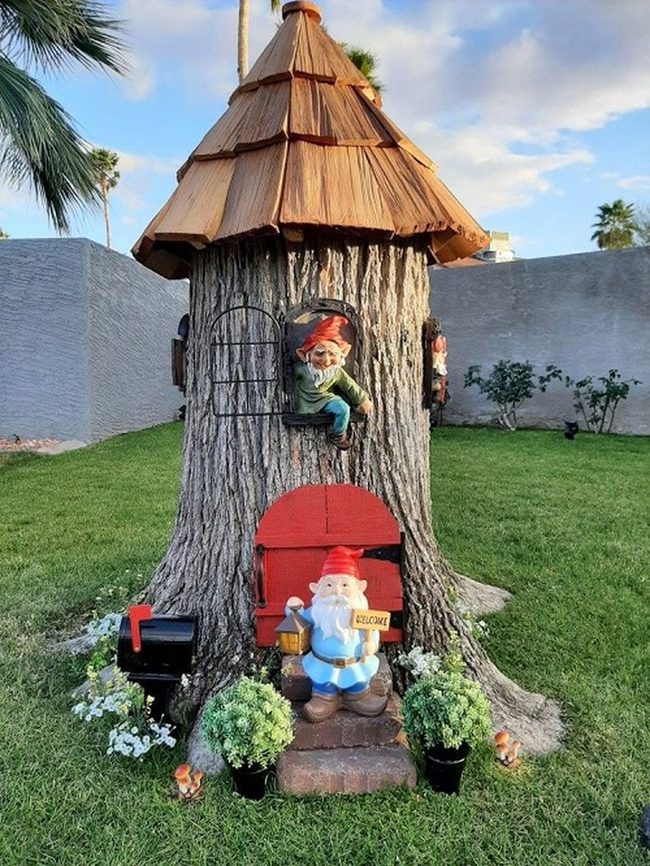 Miniature Gnome Homes Along Garden Paths