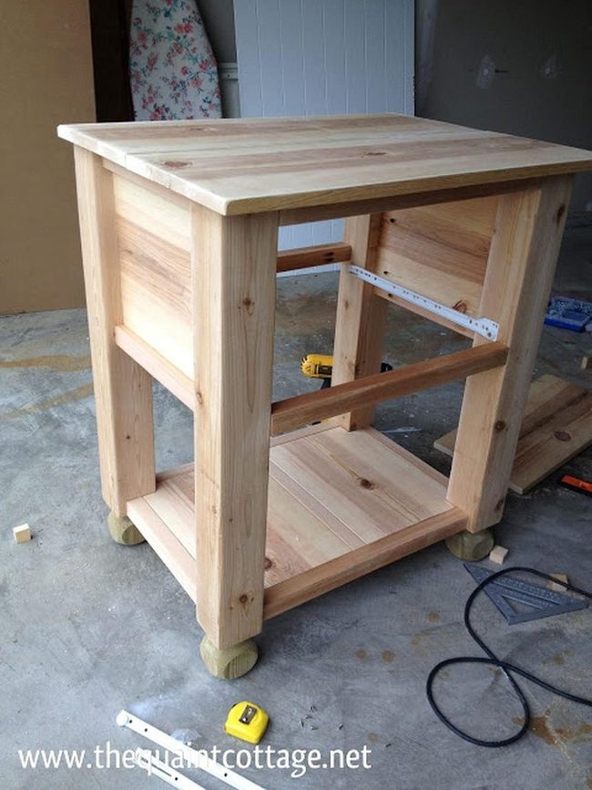 Light Wood Table With Open Shelf