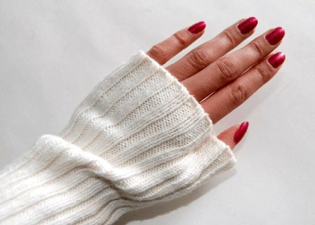 Crimson Nails Against White Ribbing