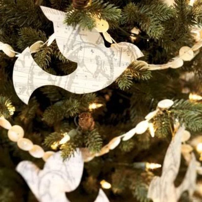 White Paper Doves On Green Branches