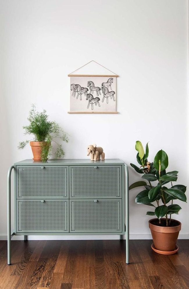 Black Horse Art Above Green Cabinet