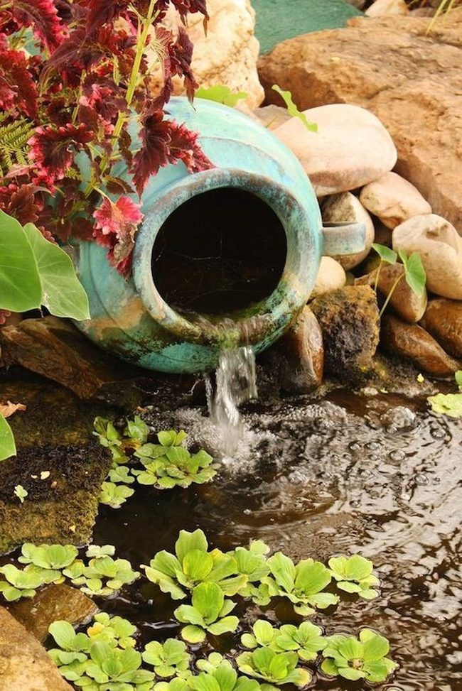 Ceramic Jugs Flowing Into Blue Ponds