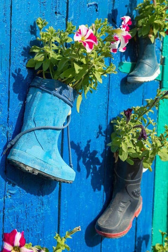Rubber Boots Overflowing With Flowers