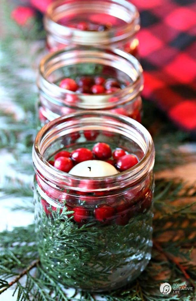 Candlelit Jars With Fresh Greenery