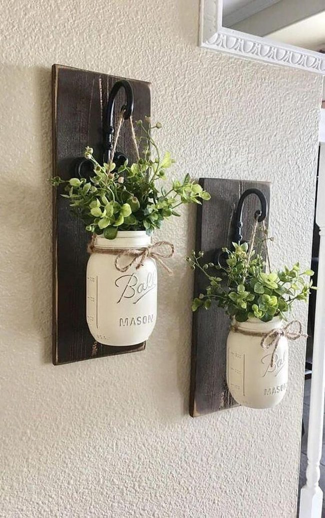 Green Mason Jars On Wood
