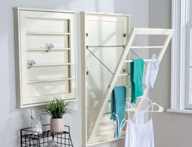 Sunlit Whites And Wooden Drying Racks