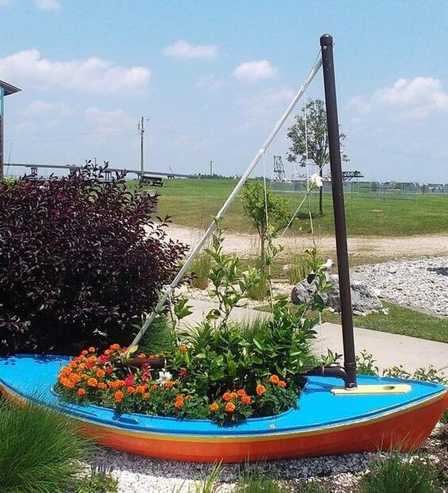 Blue Boats Blooming Garden