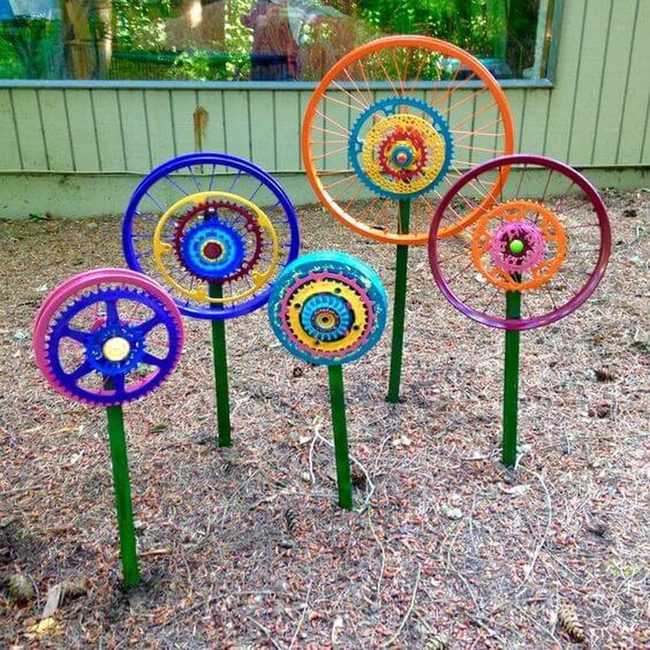 Stacked Painted Wheels Garden Art