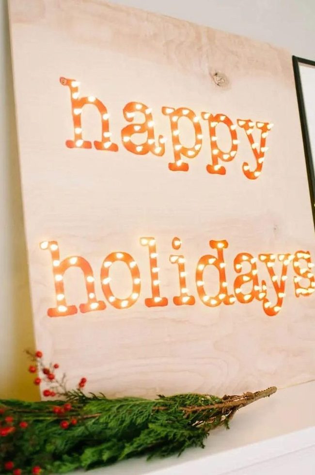Illuminated Wood Letters With Pine Branches