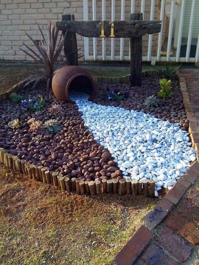 White Stones Spilling Through Dark Pebbles