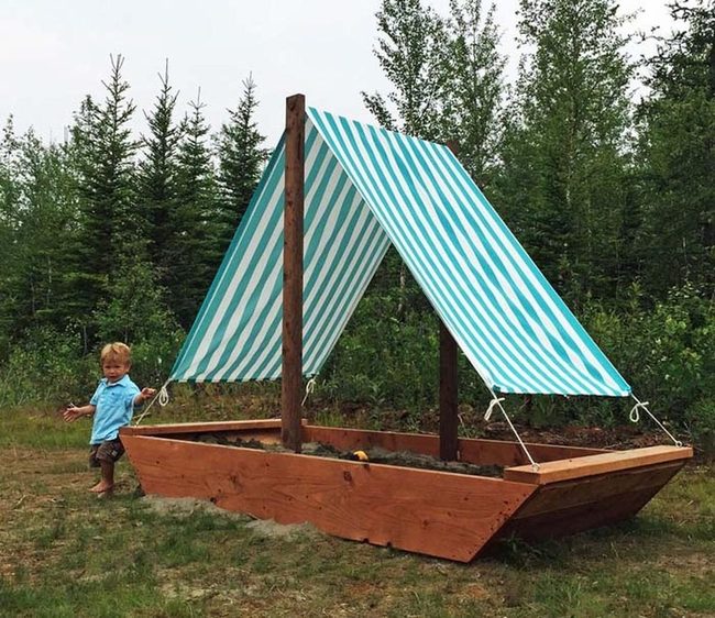 Ship-Shaped Sandbox With Sail Shade