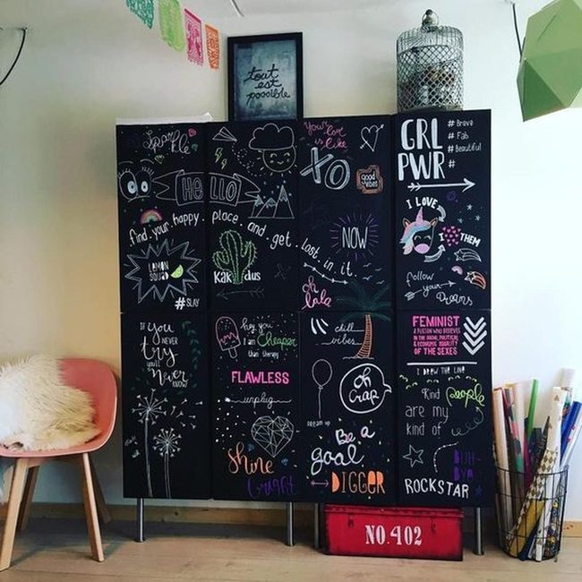 Black Chalkboard Walls With Colorful Art