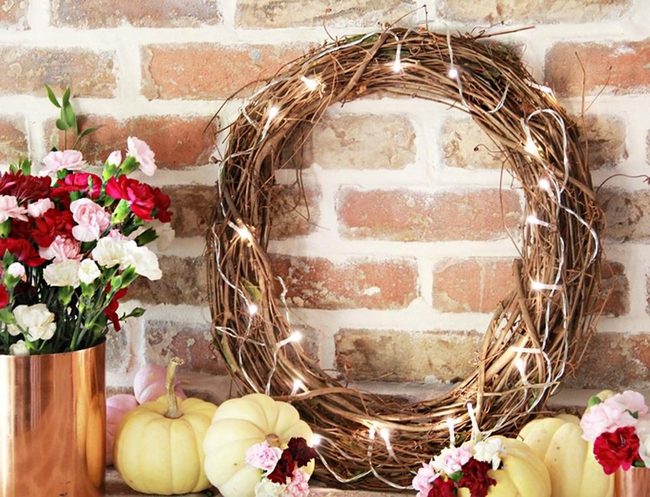 Copper Flowers Against Brick