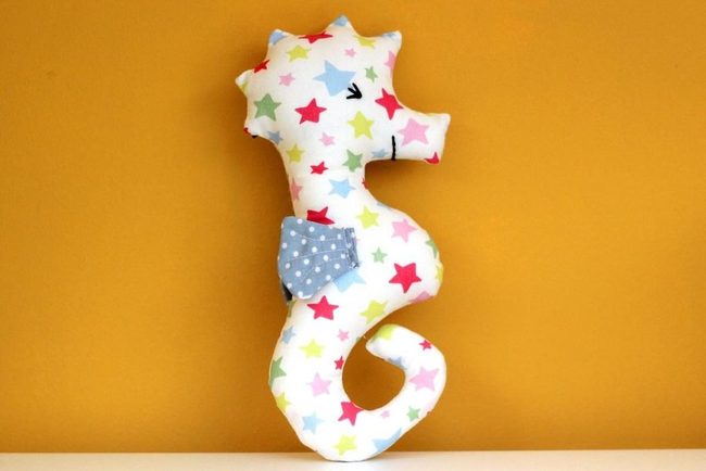 Colorful Stars On Soft White Seahorse