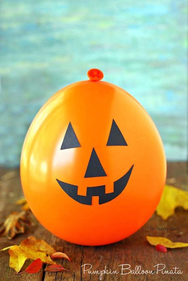 Oversized Orange Balloon Jack-O-Lanterns