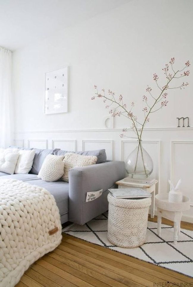 Gray Sofa With Knitted Pillows
