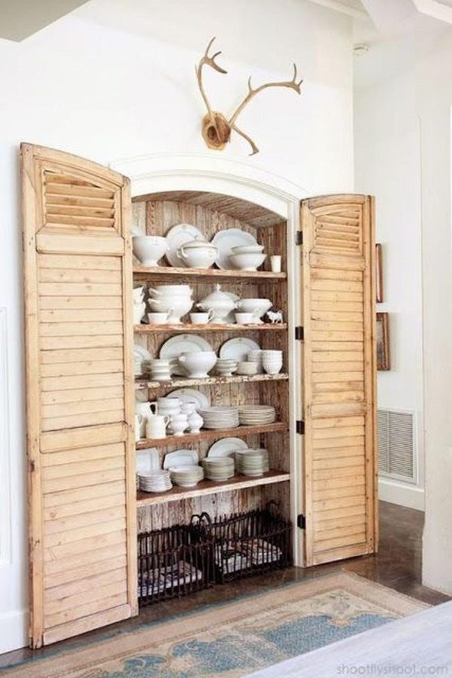 Open Wood Shelves With Antlers