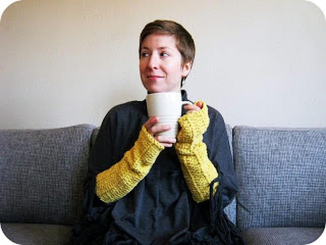 Yellow Gloves Against Dark Tones
