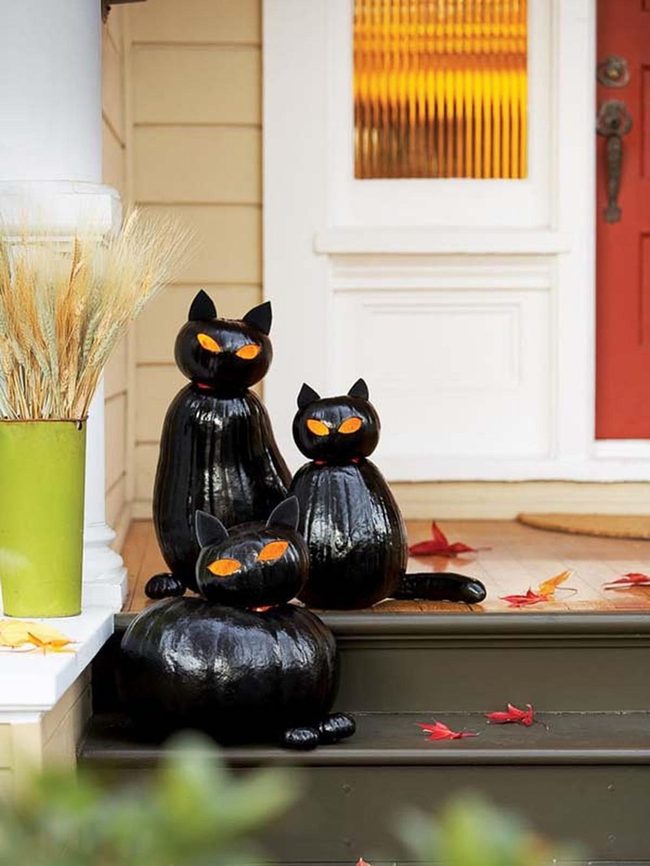 Glowing Cat Eyes On Pumpkins