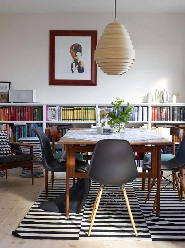 Black Chairs Warm Wood Striped Floor